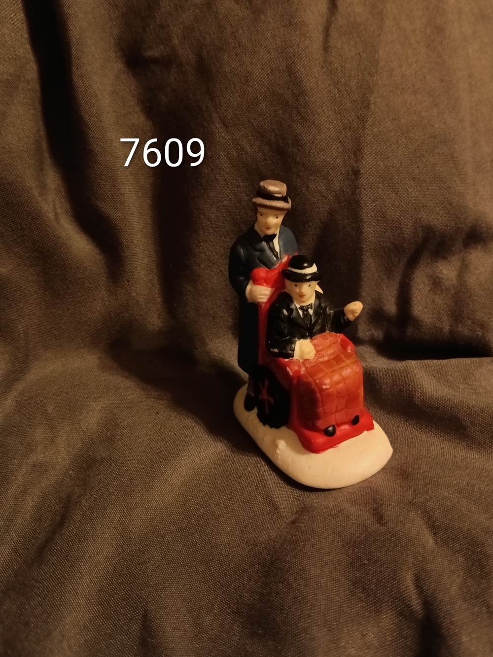 4 Piece Christmas Village Figurines
